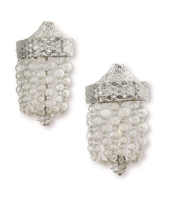 Coppia di appliques in vetro. XX secolo