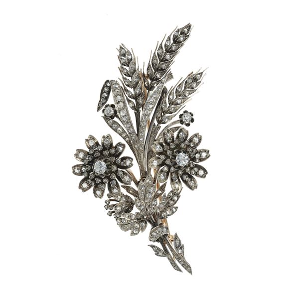 Old-cut diamond, silver and gold "en tremblant" brooch. French assay mark