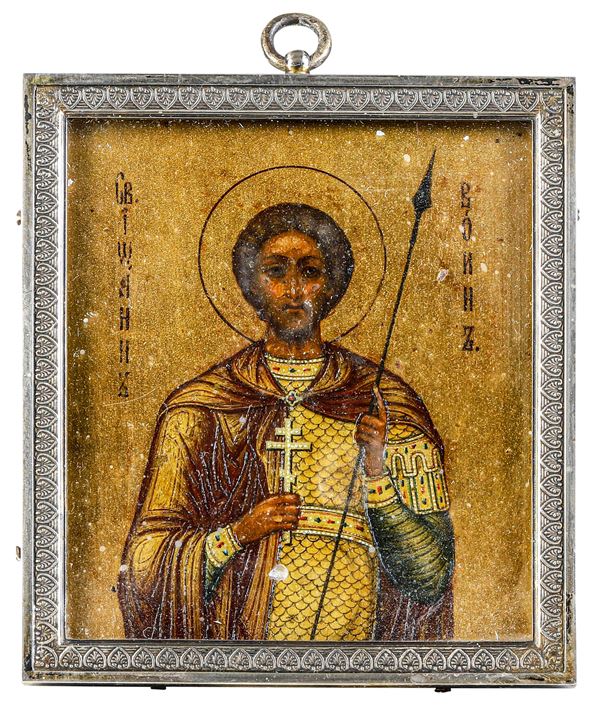 Icona raffigurante San Giovanni il soldato (o il russo). Cornice in argento. Russia, Mosca, inizi XX secolo. Marchio di titolo 88 zolotnik, marchio dell'atelier Fabergè e del maestro argentiere (parziale di difficile lettura).