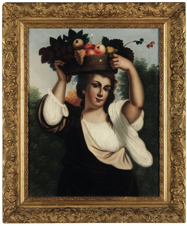 Giovane donna con cesta di frutti