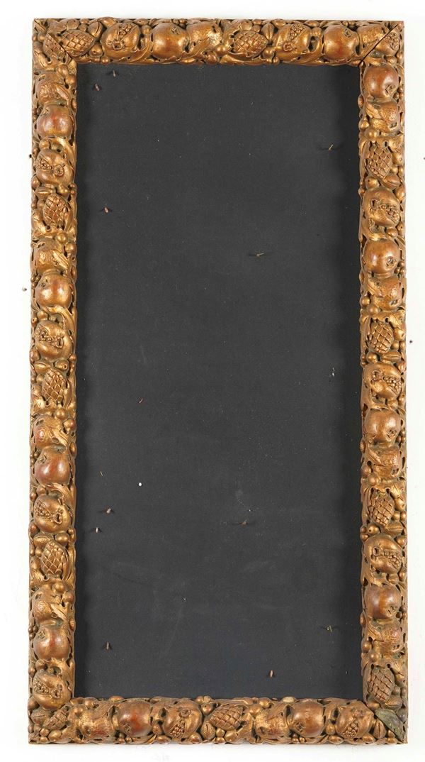 Cornice in legno dorato e intagliato. XX secolo