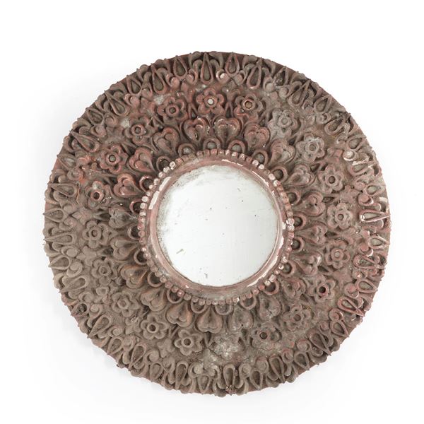 Specchiera circolare in legno intagliato e laccato