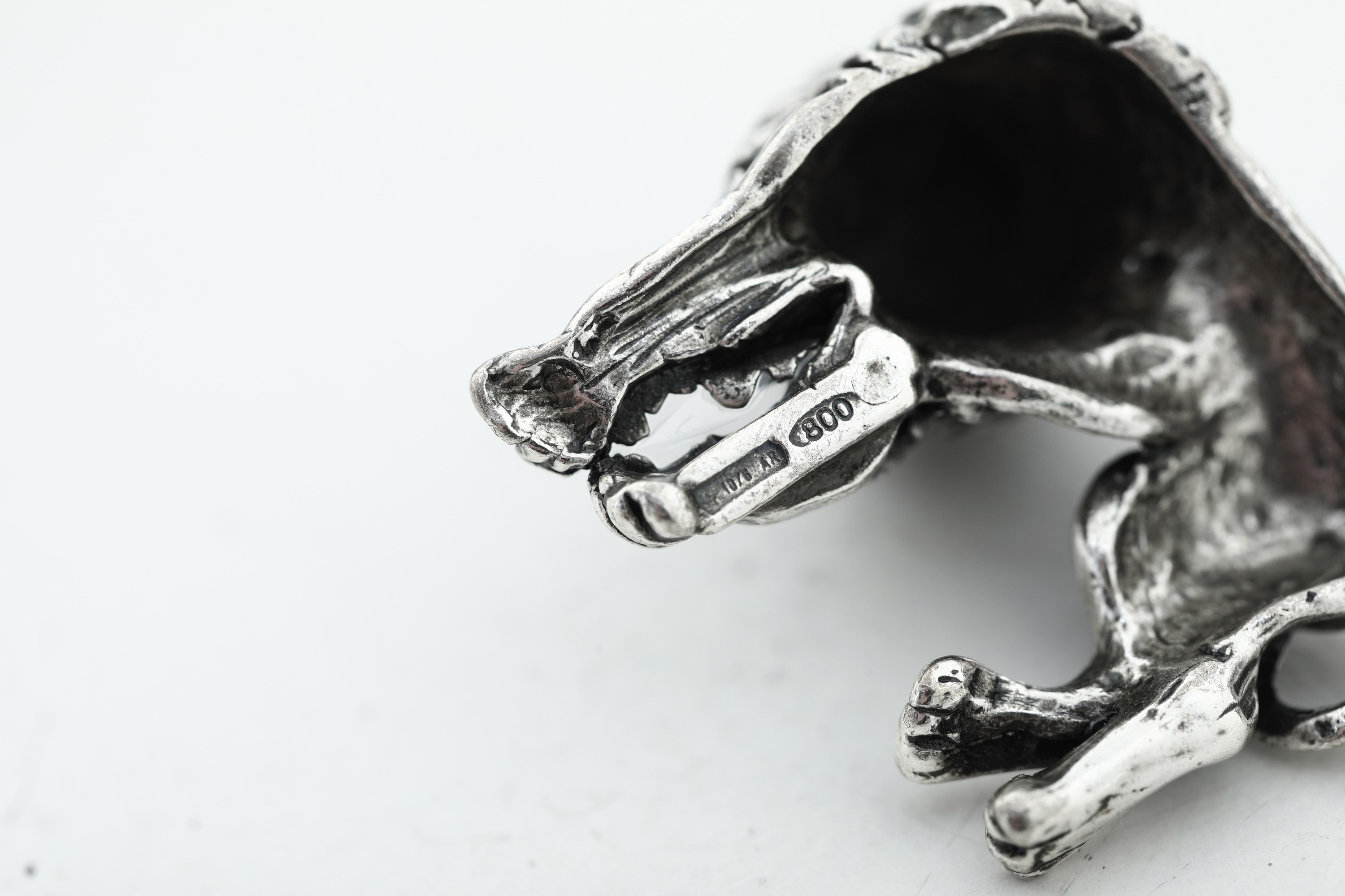 Lotto composto da oggetti decorativi vari, XX secolo, argento fuso e sagomato