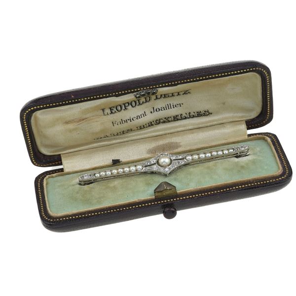 Pearl, diamond and platinum brooch. Fitted case