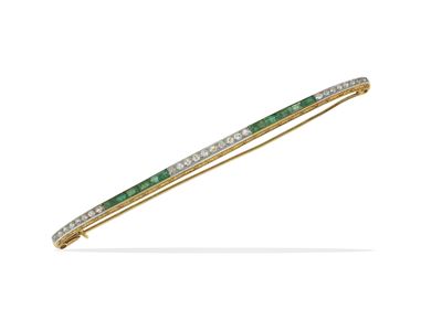 Spilla, diamanti e smeraldi, in oro giallo 750/1000 e platino