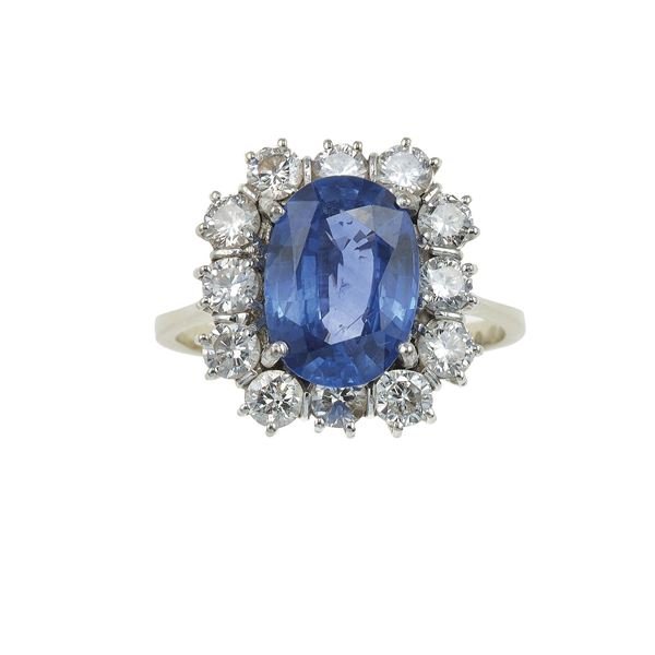 Sapphire and diamond cluster ring. Heated