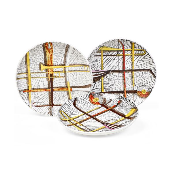 Tre sottobicchieri "Orchestra". Milano, Fornasetti, 1950 circa.