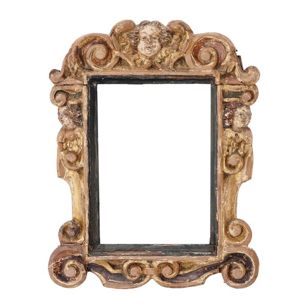 Cornice sansovinesca in legno intagliato e dipinto. Veneto XVI-XVII secolo