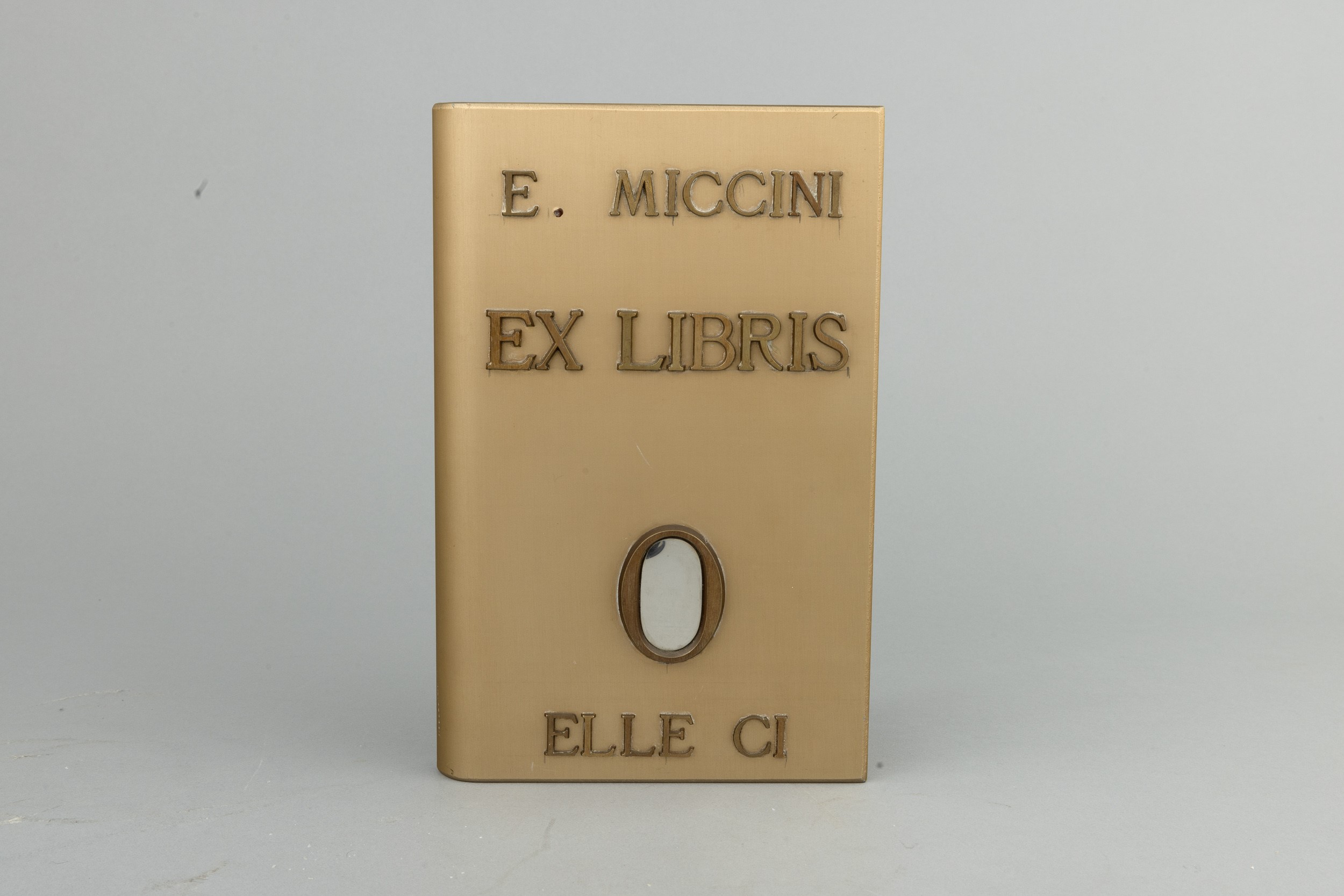 Eugenio Miccini - Ex libris, scultura in bronzo dorato con specchio