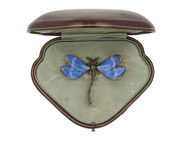 Enamel, silver and low karat gold brooch. Fitted case