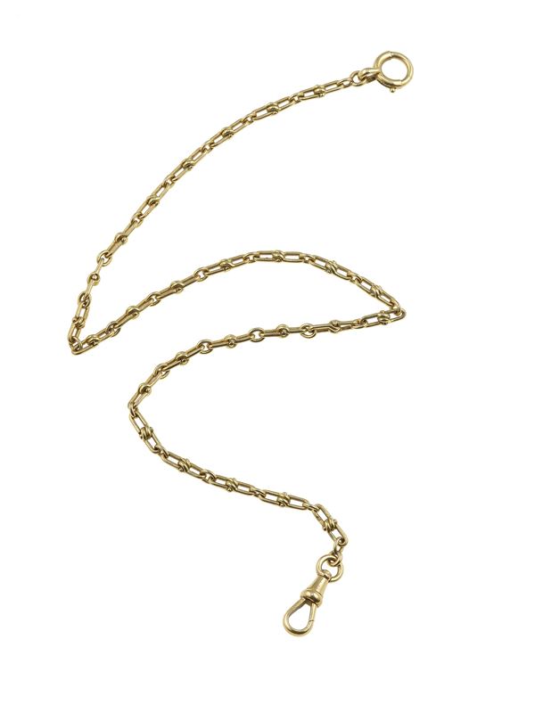 Gold watch chain. Signed Cartier, Paris and numbered 2719