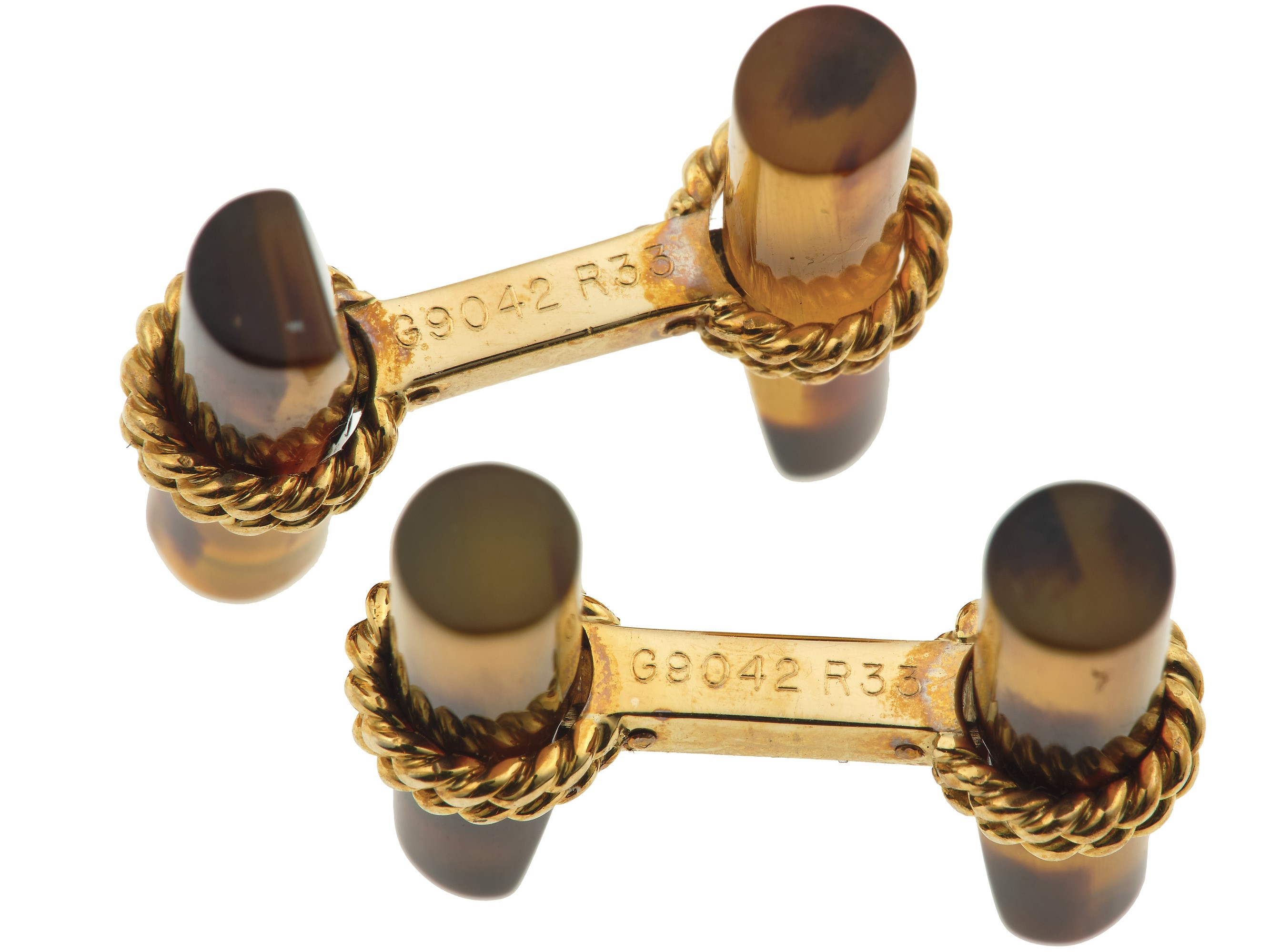 Van Cleef & Arpels, Bottoni da polso in oro giallo 750/1000 e bachelite