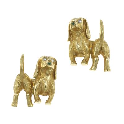 Paio di bottoni da polso a tema “cagnolini”, montatura in oro giallo 750/1000