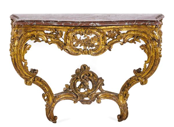 Consolle a goccia in legno intagliato e dorato. Francia, XVIII secolo