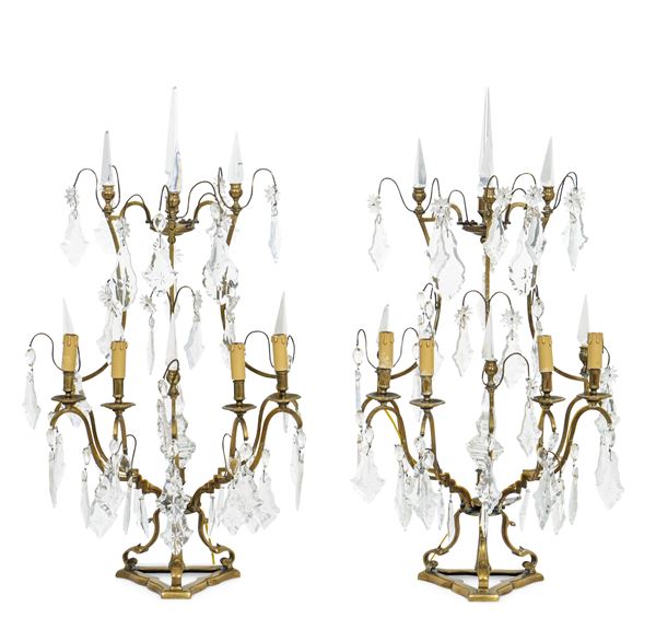 Coppia di girandoles in bronzo dorato. XIX secolo