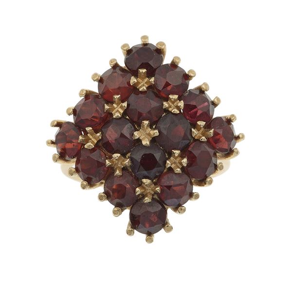 Granate and gold ring