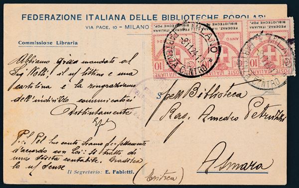 1924 – Regno d’Italia – Enti parastatali – Cartolina da Milano ad Asmara (Eritrea) affrancata con una striscia di tre valori del 10 cent. rosa “FEDERAZ. ITALIANA / BIBLIOTECHE POP.” (Sass. 34).