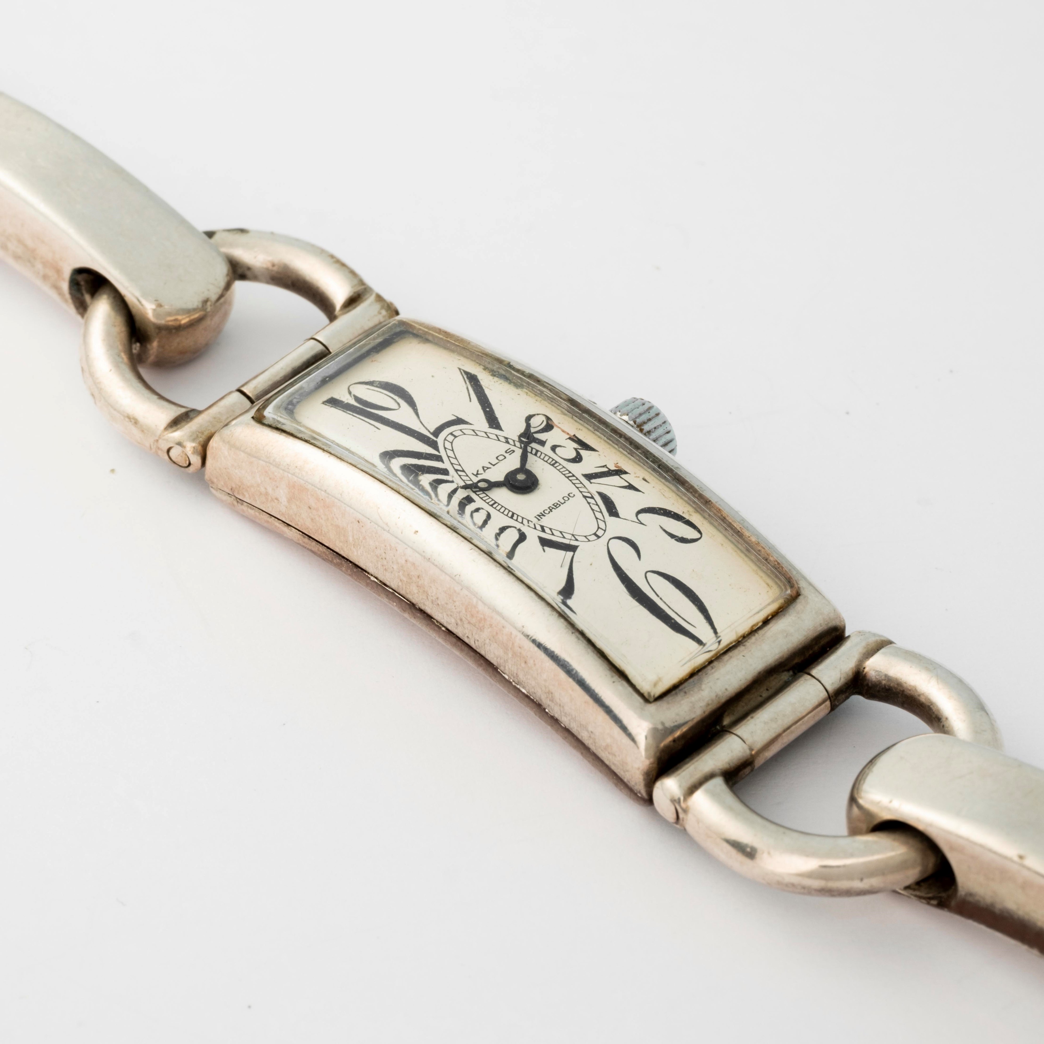 Kalos - Orologio Curvex in argento 800 con bracciale integrato, quadrante bianco, circa 1950