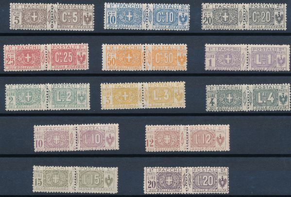 1914-22 – Regno d’Italia – Pacchi Postali – Stemma e cifra su due sezioni dentellate al centro e nodi sabaudi – serie completa (Sass. S.2101).
