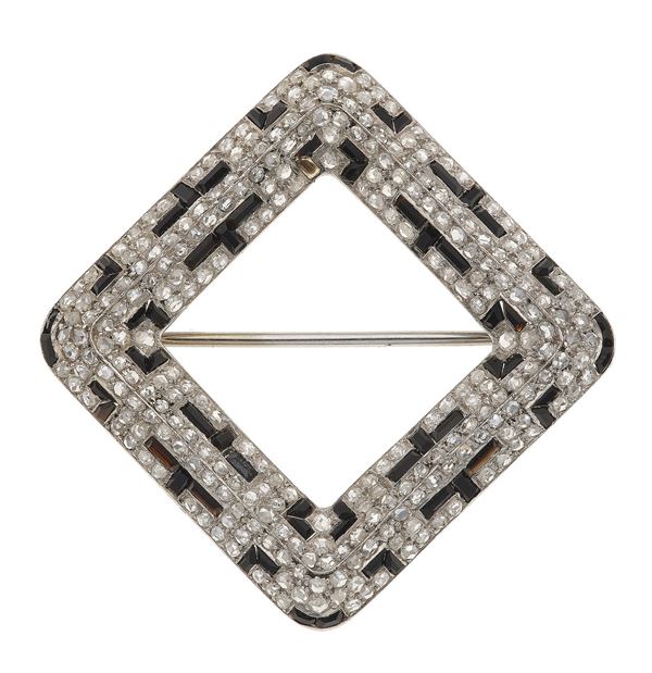 Cartier Londres. Spilla con diamanti e onice