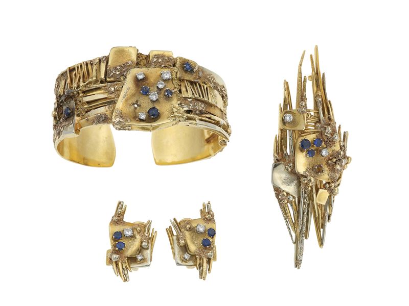 C. Negri. Parure composta da bracciale, spilla ed orecchini con diamanti e zaffiri  - Asta Fine Jewels - Cambi Casa d'Aste