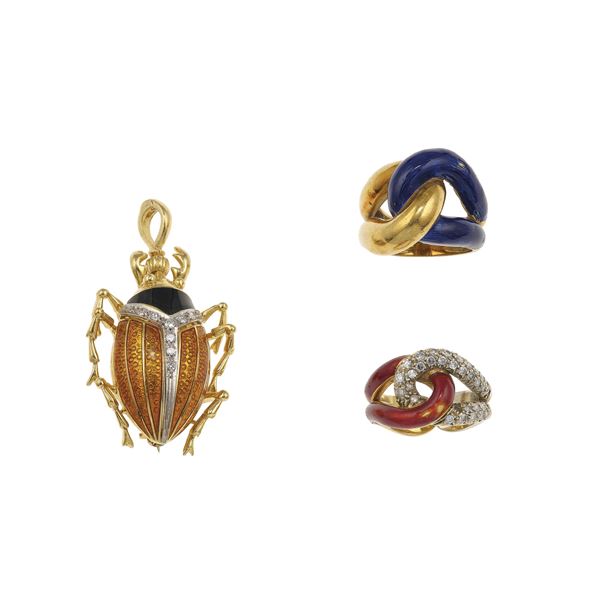 Two gold and enamel rings and one enamel and gold pendent/brooch. Minor damage to the enamel and a missing diamond