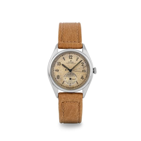 Rolex - Rare Ovettone ref 5028/6 in steel with double seconds at centre and six o'clock, circa 1945