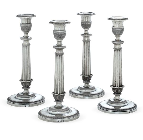Quattro candelieri. Milano XIX secolo, argentiere Giuseppe Sciomachen