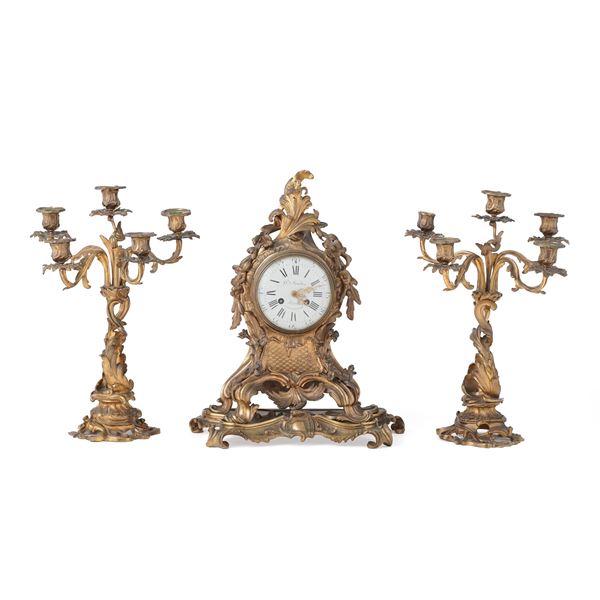 Trittico da camino in bronzo dorato. Francia, XIX secolo