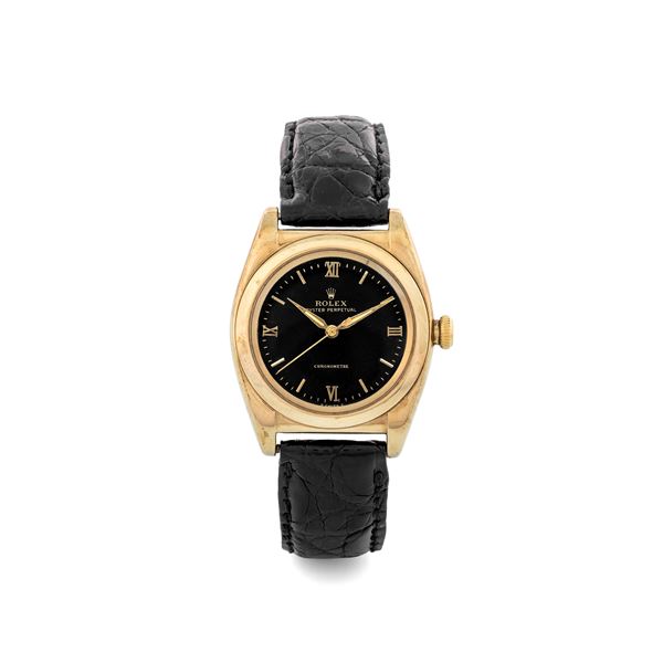 Rolex - Ovetto ref 3131 in 18k yellow gold, black dial Gilt central seconds, circa 1947