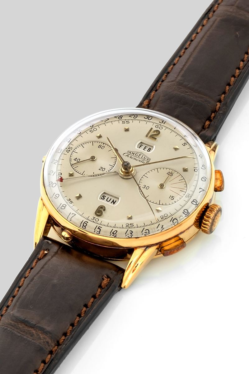 Angelus : 18k yellow gold chronodate, silvered dial with
