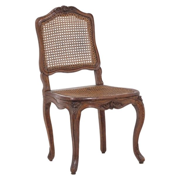 Sedia in legno intagliato con seduta e schienale in cannetè, XVIII secolo
