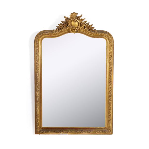 Specchiera in legno e pastiglia dorati. XIX secolo