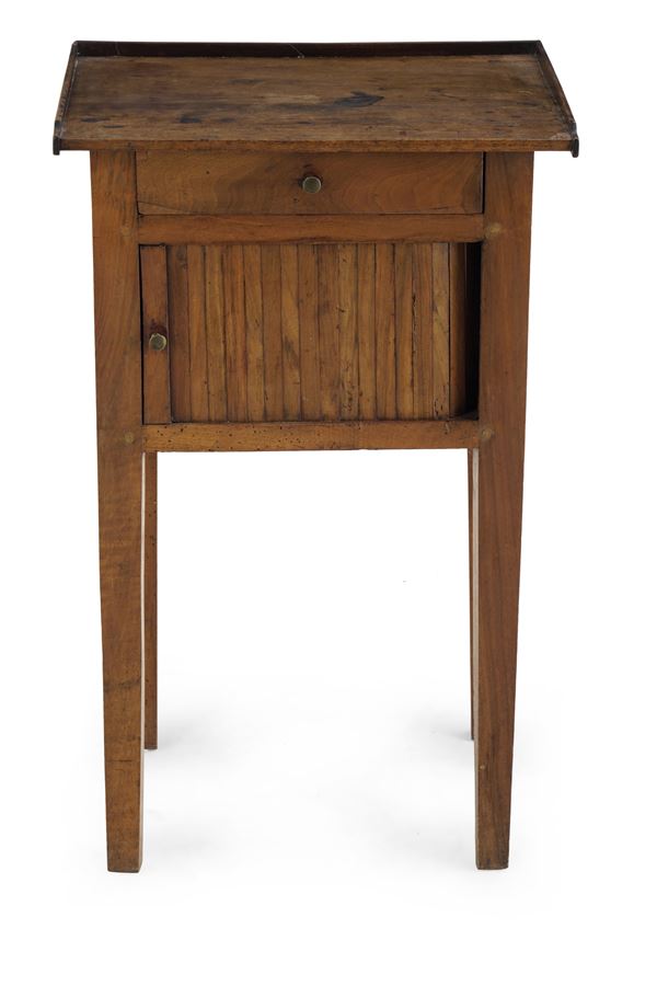 Comodino in legno ad un cassrtto. XIX secolo