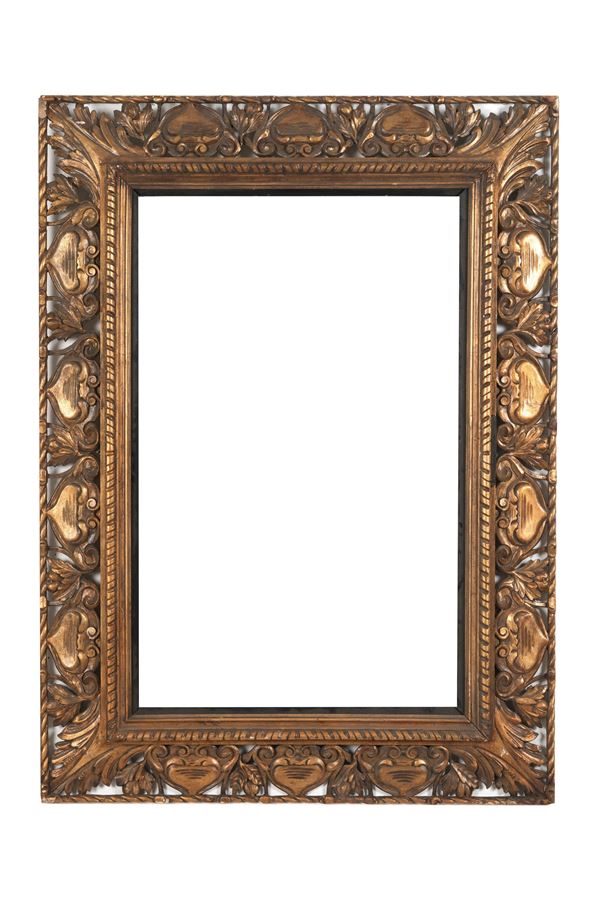 Grande cornice in legno intagliato e traforato, XX ssecolo