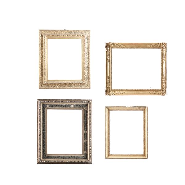 Quattro cornici in legno diverse