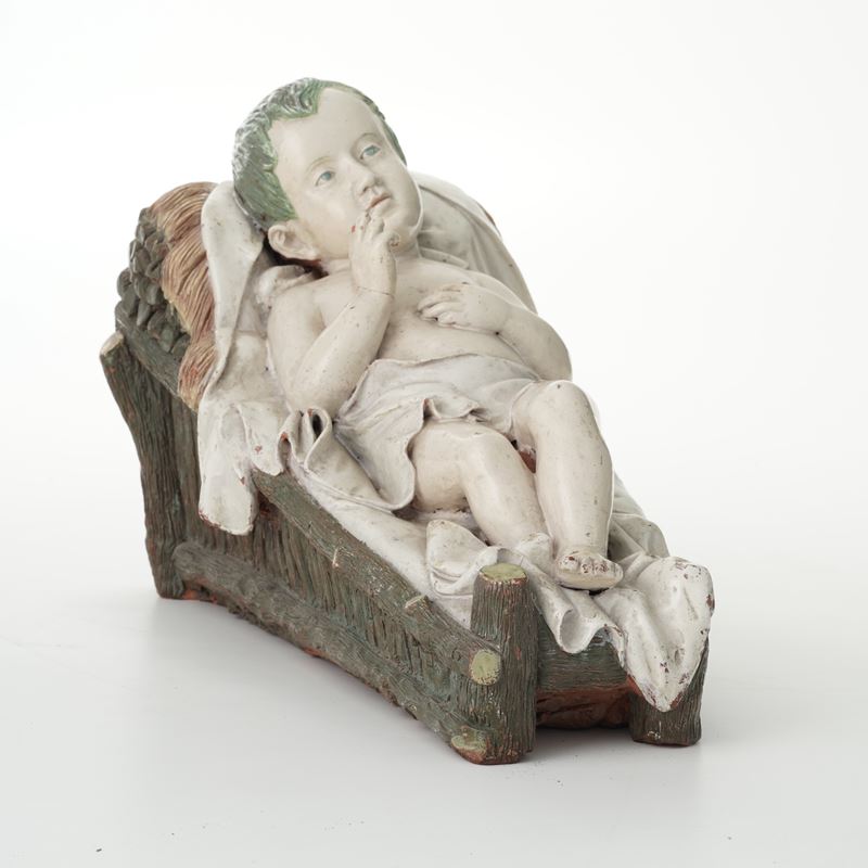 Scultura con Gesù bambino, fine del XIX secolo.  - Auction Majolica, Porcelain and Glass - Cambi Casa d'Aste