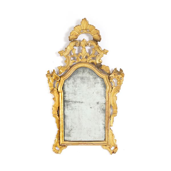 Specchiera in legno intagliato e dorato. XVIII secolo