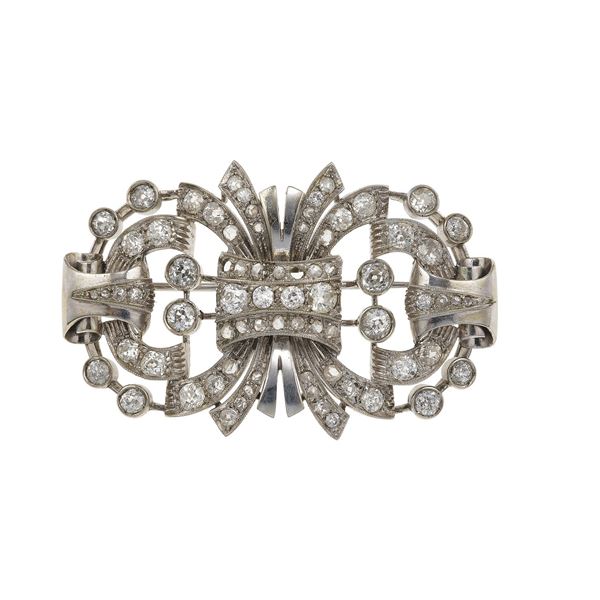 Gold and old-cut diamond brooch. One missing diamond