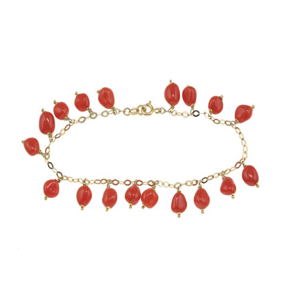 Coral and gold bracelet