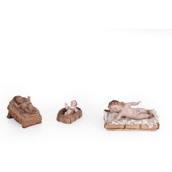 Insieme di due Bambin Gesù e un angioletto. Arte presepiale, Italia, XX secolo