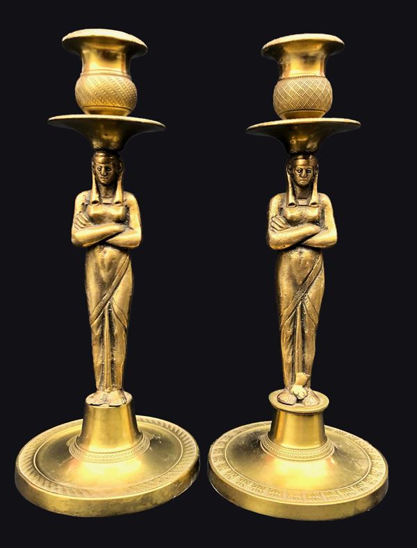 DUE CANDELIERI IN BRONZO, RETOUR D’EGYPTE