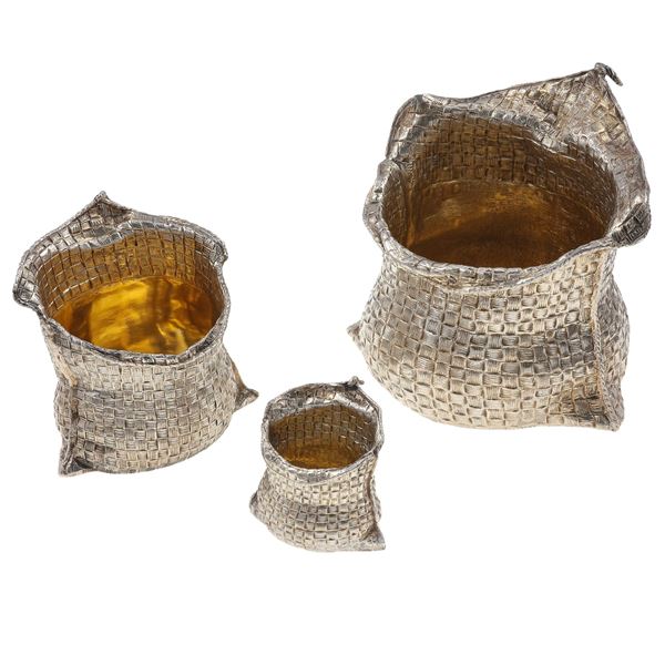 Three silver holder. Signed M. Buccellati