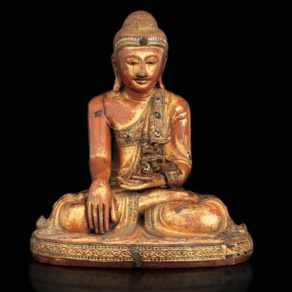 Figura di Buddha Sakyamuni in legno laccato con tracce di policromia e inserti in pietre dure, Thailandia, XIX secolo