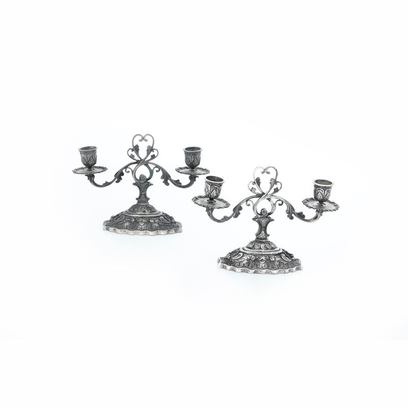 Coppia di candelabri. Argenteria italiana del XX secolo  - Auction Silvers and Icons - Cambi Casa d'Aste