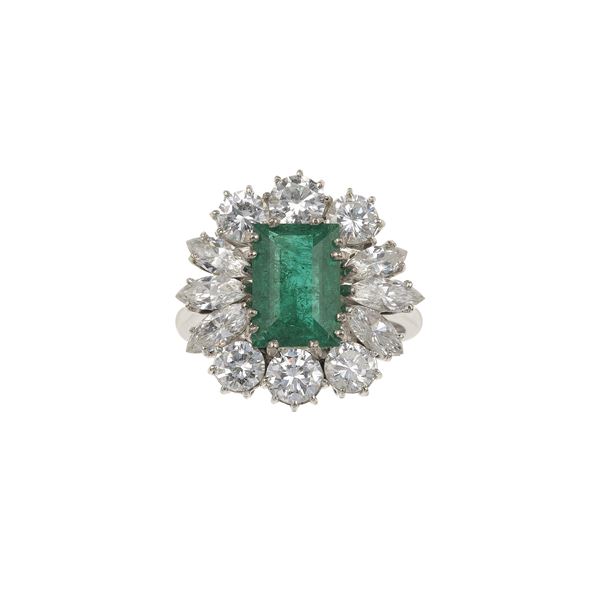 Colombia emerald weighing approximately 2.40 carats, diamond and gold ring