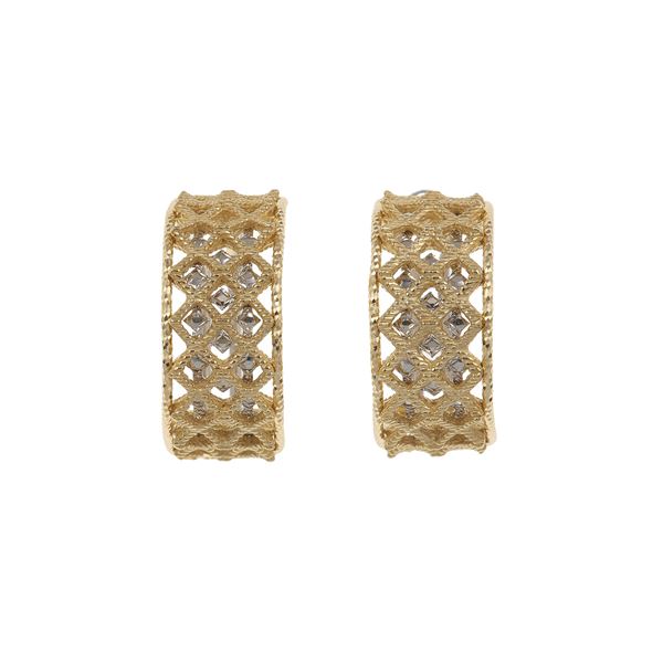 Pair of gold earrings