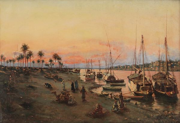 Veduta del Nilo con imbarcazioni al tramonto