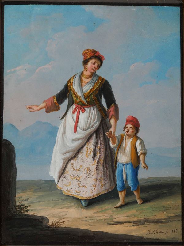 Madre e figlio in costumi tradizionali
