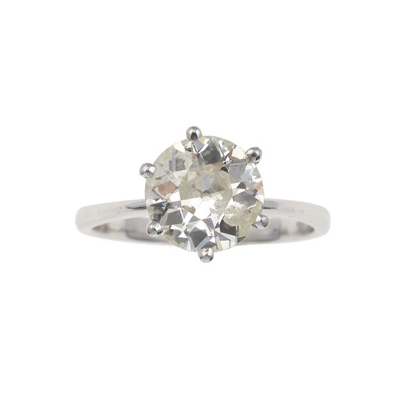 Old-cut diamond weighing carats 2.50 carats approximately, gold ring. The diamond is damaged